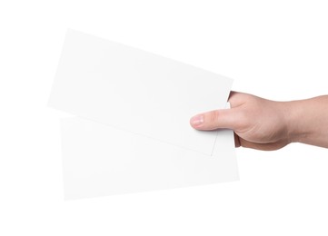 Photo of Woman holding flyers on white background, closeup. Mockup for design