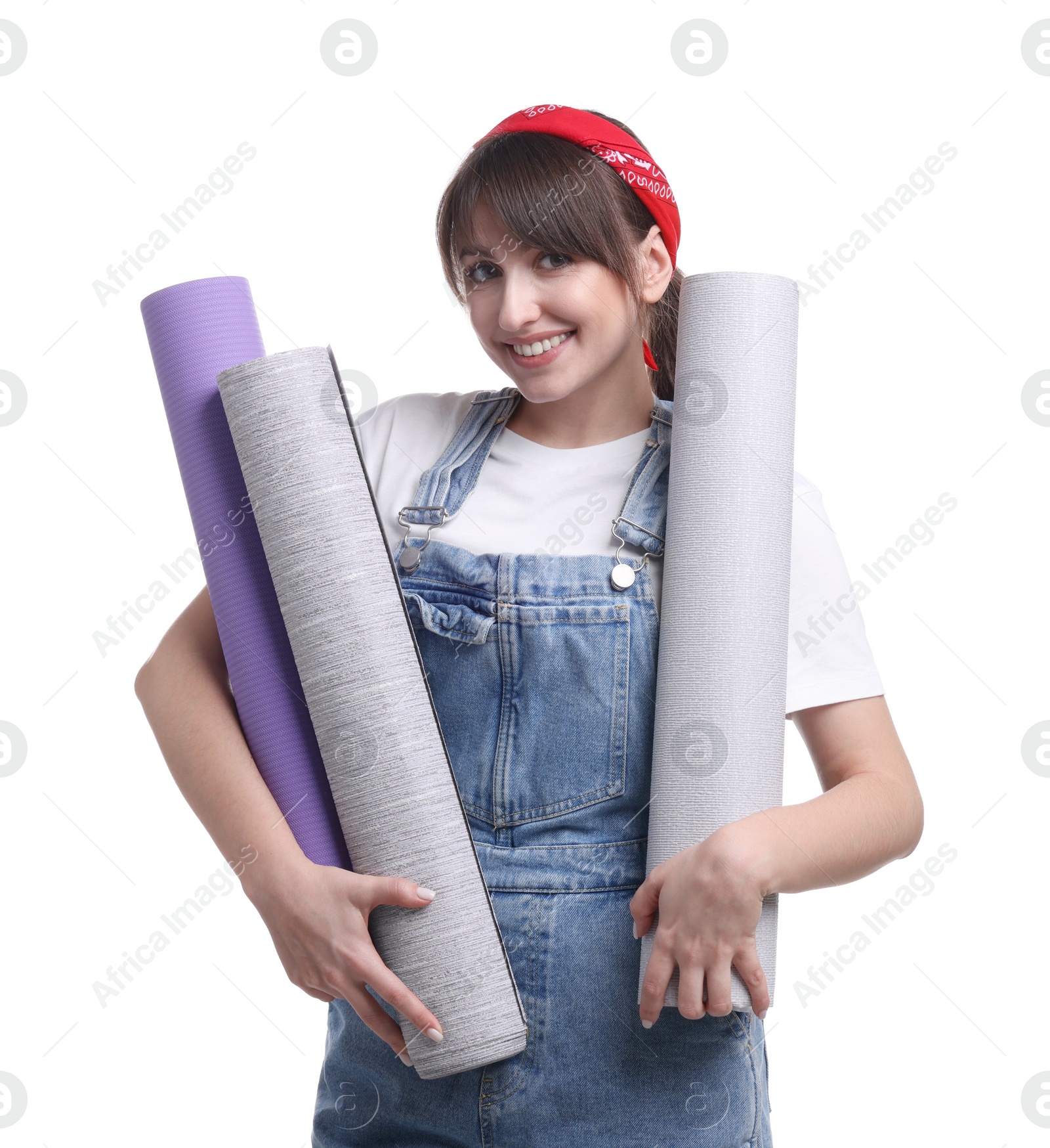 Photo of Beautiful woman with wallpaper rolls on white background