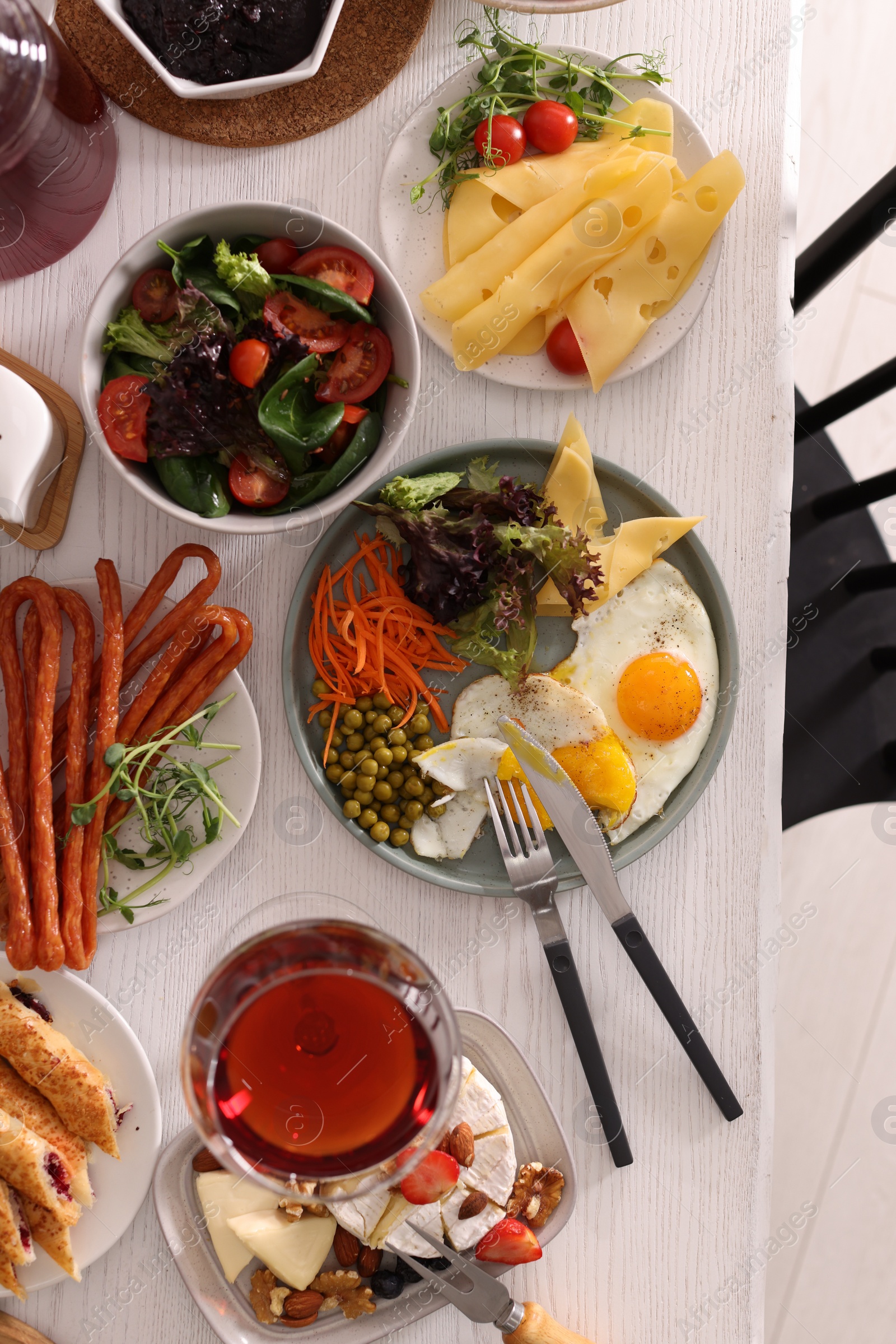 Photo of Many different dishes served on buffet table for brunch, flat lay