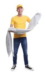 Dry-cleaning delivery. Happy courier holding garment cover with clothes on white background