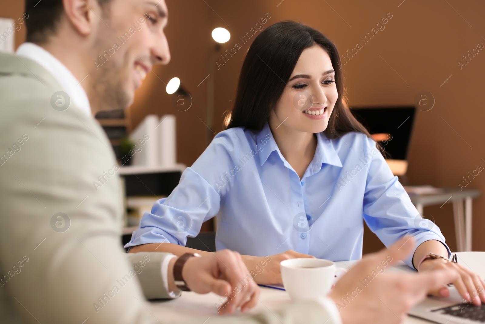 Photo of Human resources manager conducting job interview with applicant in office