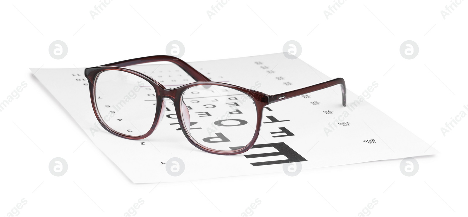 Photo of Glasses and vision test chart isolated on white