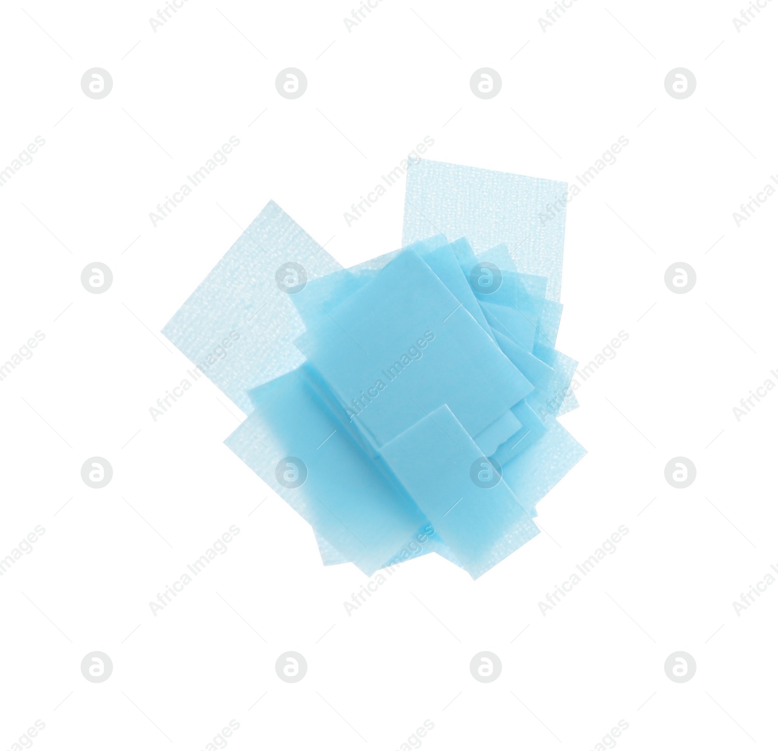 Photo of Pieces of light blue confetti isolated on white