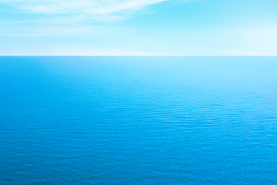 Beautiful ripply sea under blue sky with clouds