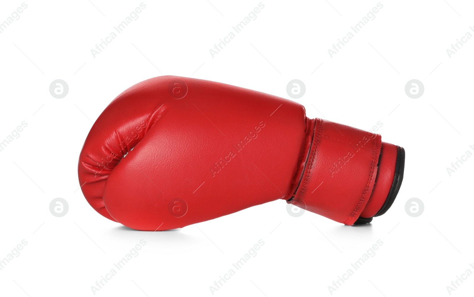 Photo of New red boxing glove isolated on white