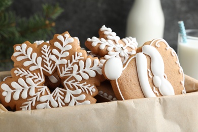 Decorated Christmas gingerbread cookies in box, closeup