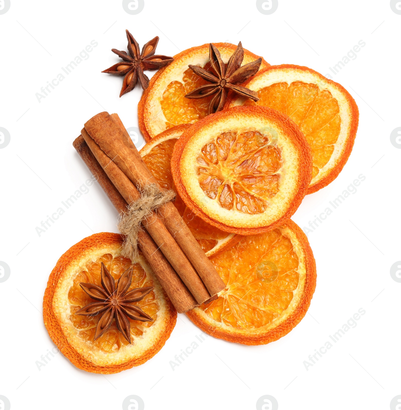 Photo of Dry orange slices, cinnamon sticks and anise stars isolated on white, top view