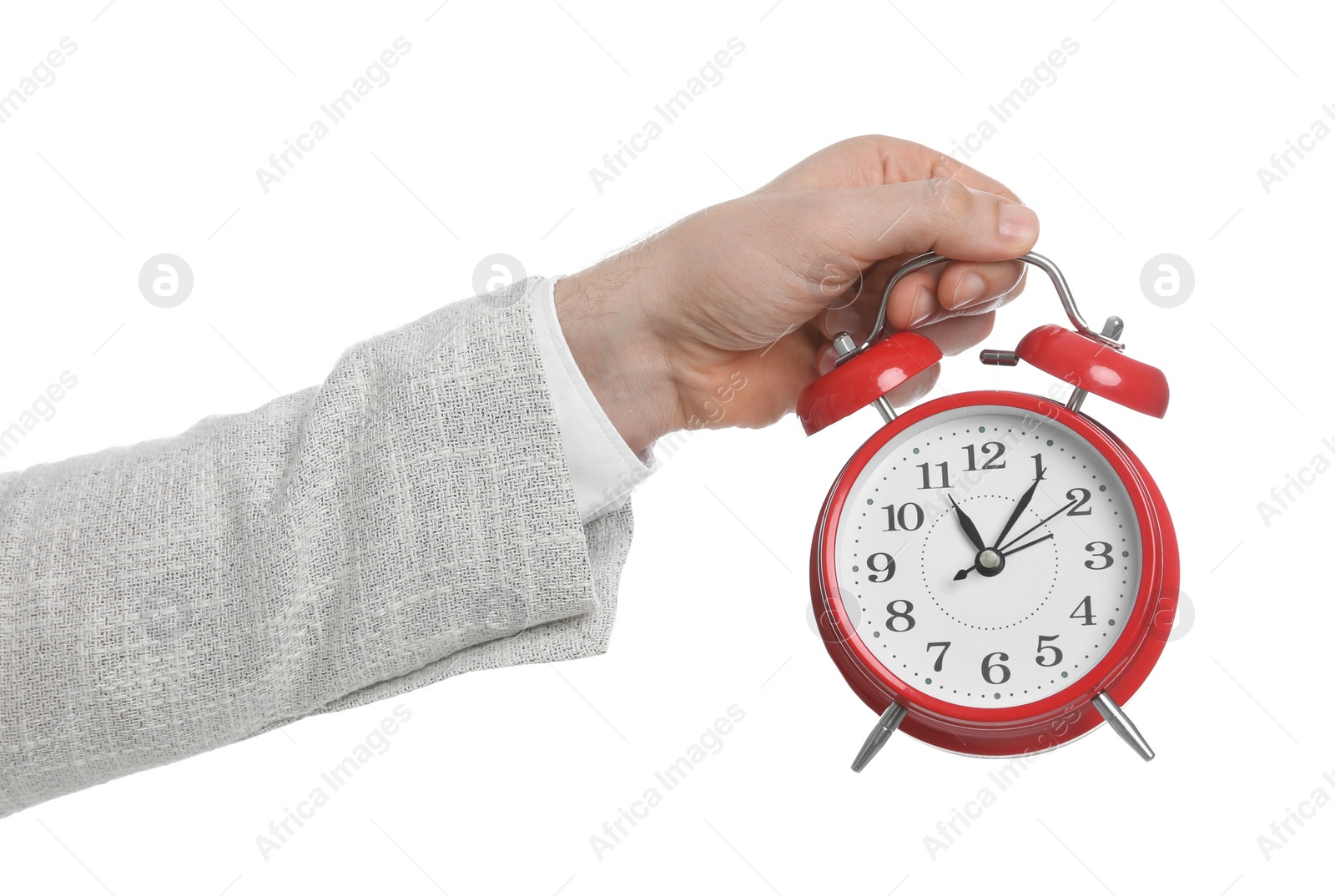 Photo of Businessman holding alarm clock on white background, closeup. Time management