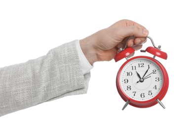 Businessman holding alarm clock on white background, closeup. Time management