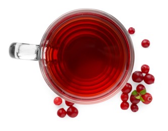 Photo of Cup of delicious cranberry tea and berries isolated on white, top view