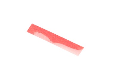 Photo of Piece of red confetti isolated on white