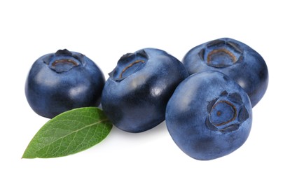 Photo of Many fresh ripe blueberries and leaf isolated on white