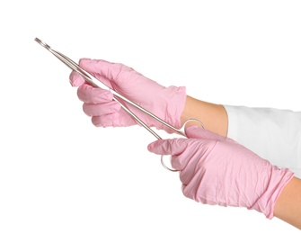 Photo of Doctor in sterile gloves with medical forceps on white background