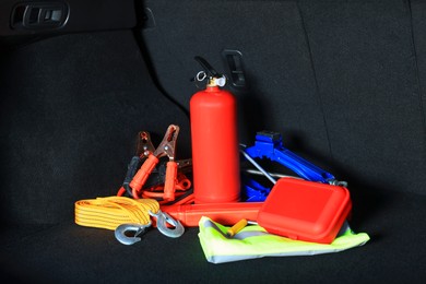 Photo of Set of car safety equipment in trunk