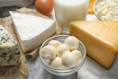 Photo of Different delicious dairy products on table, closeup