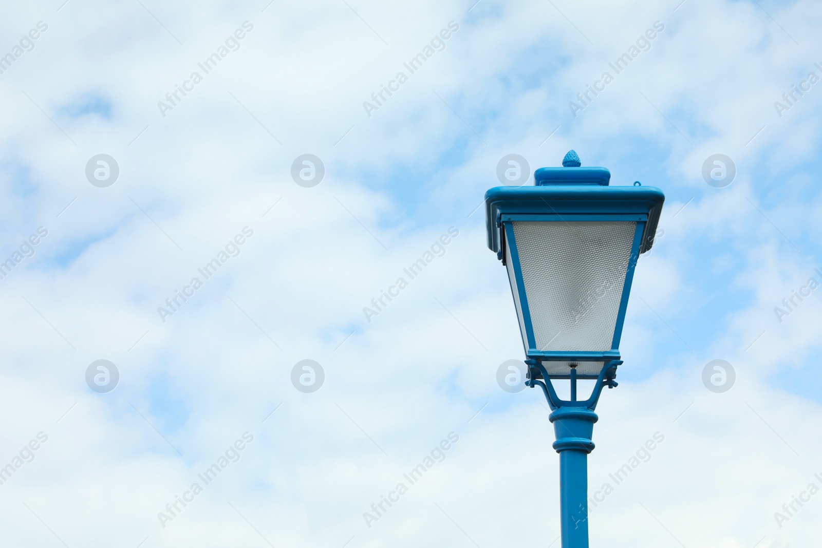 Photo of Beautiful street lamp outdoors on sunny day. Space for text