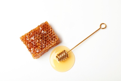 Photo of Composition with fresh honeycomb on white background, top view