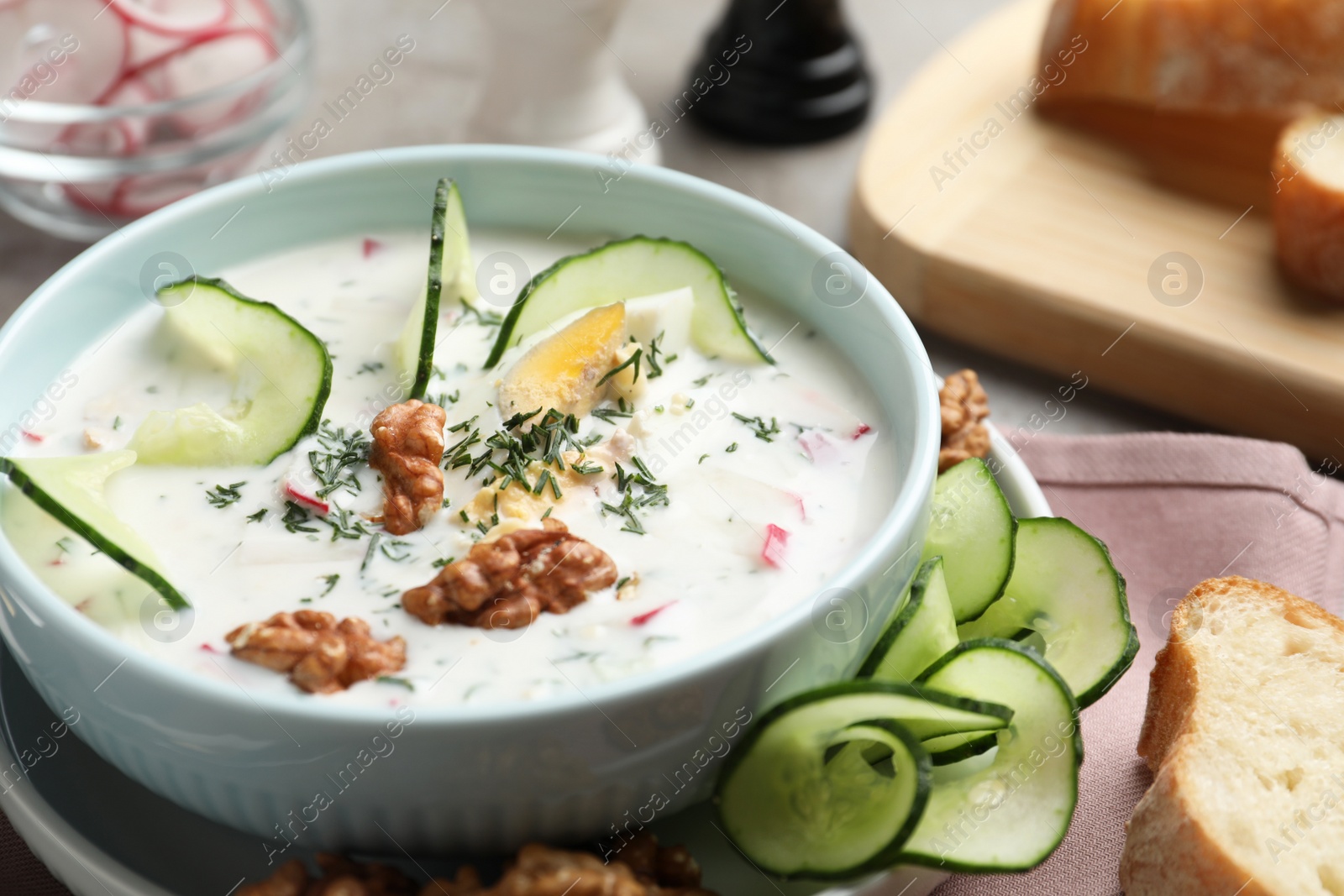 Photo of Delicious cold summer soup on table, closeup