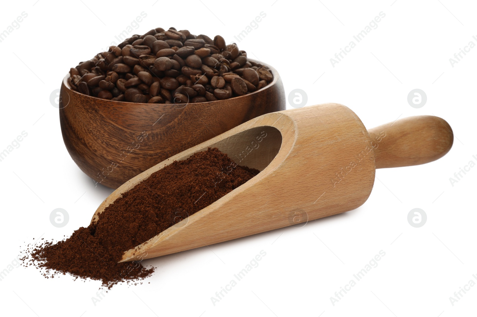 Photo of Coffee grounds and roasted beans on white background