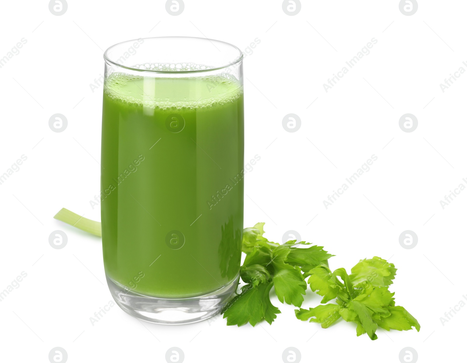 Photo of Glass of celery juice and fresh vegetable on white background