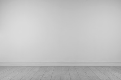 Photo of Blank white wall in room. Space for design