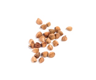 Photo of Uncooked buckwheat on white background. Healthy diet