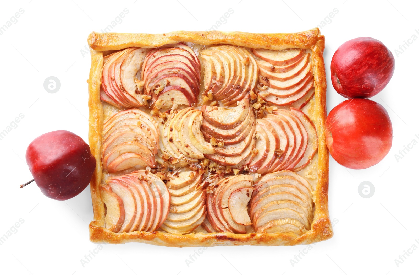 Photo of Tasty apple pie with nuts and fresh fruits isolated on white, top view