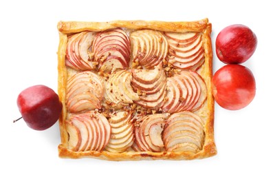 Tasty apple pie with nuts and fresh fruits isolated on white, top view