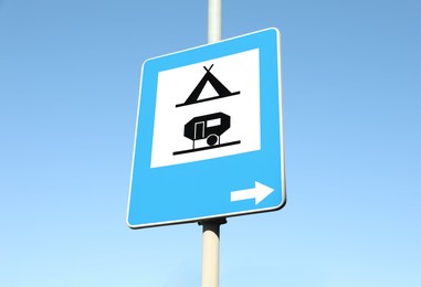 Photo of Traffic sign Camping Site Equipped With Power Sockets For Trailers outdoors on sunny day