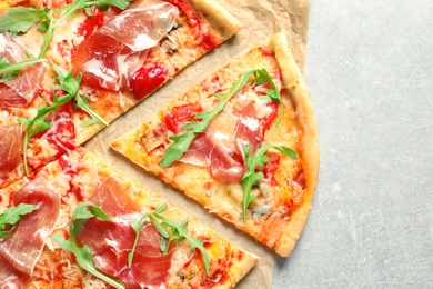 Photo of Delicious pizza with meat on light background, top view