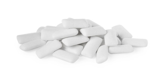 Photo of Pile of tasty chewing gums on white background