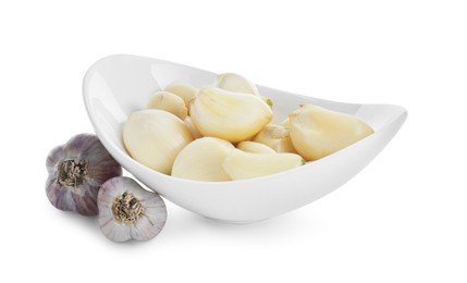 Photo of Bulbs and cloves of garlic isolated on white