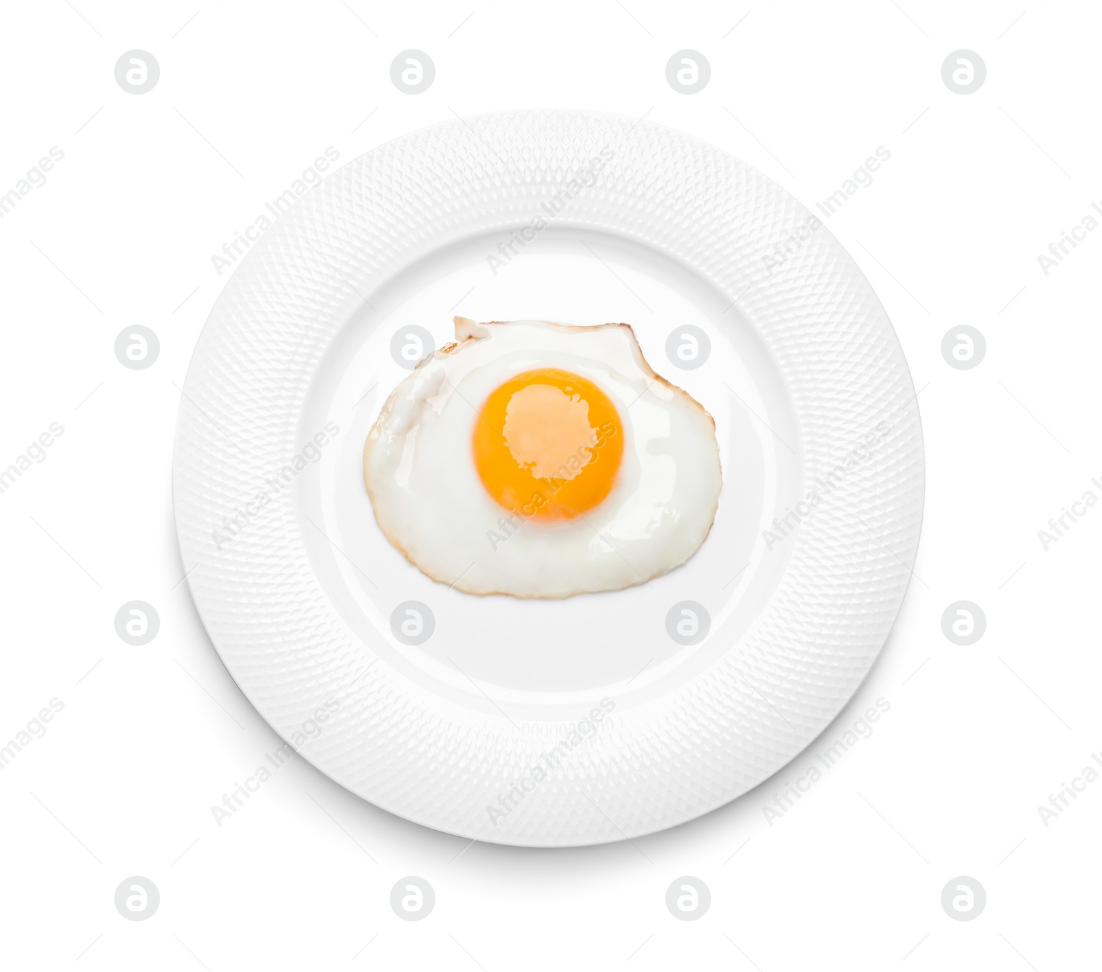 Photo of Plate with delicious fried egg isolated on white, top view