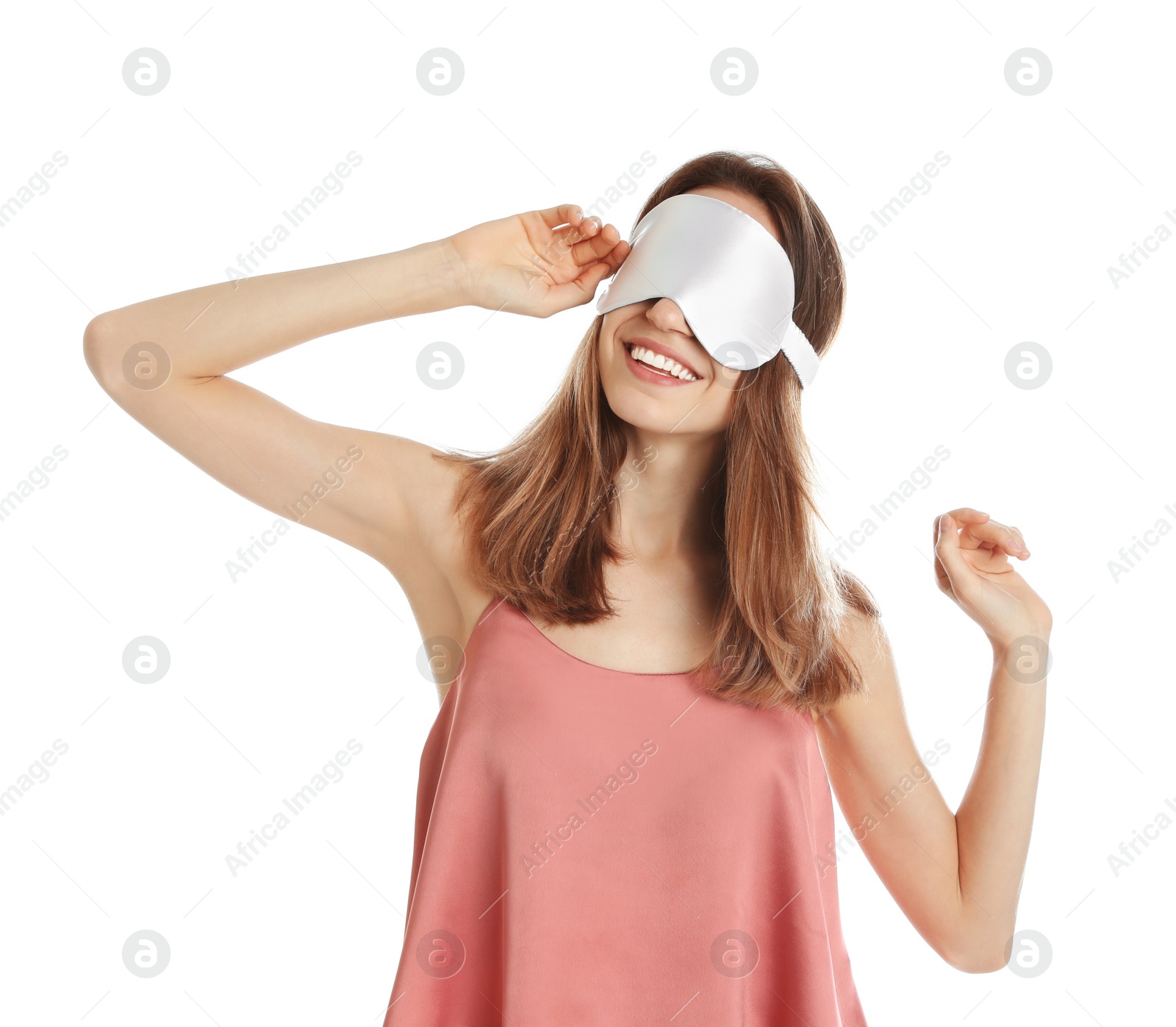 Photo of Beautiful woman wearing pajamas and sleep mask on white background. Bedtime