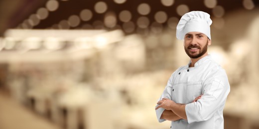 Image of Smiling chef in uniform at restaurant, space for text. Banner design