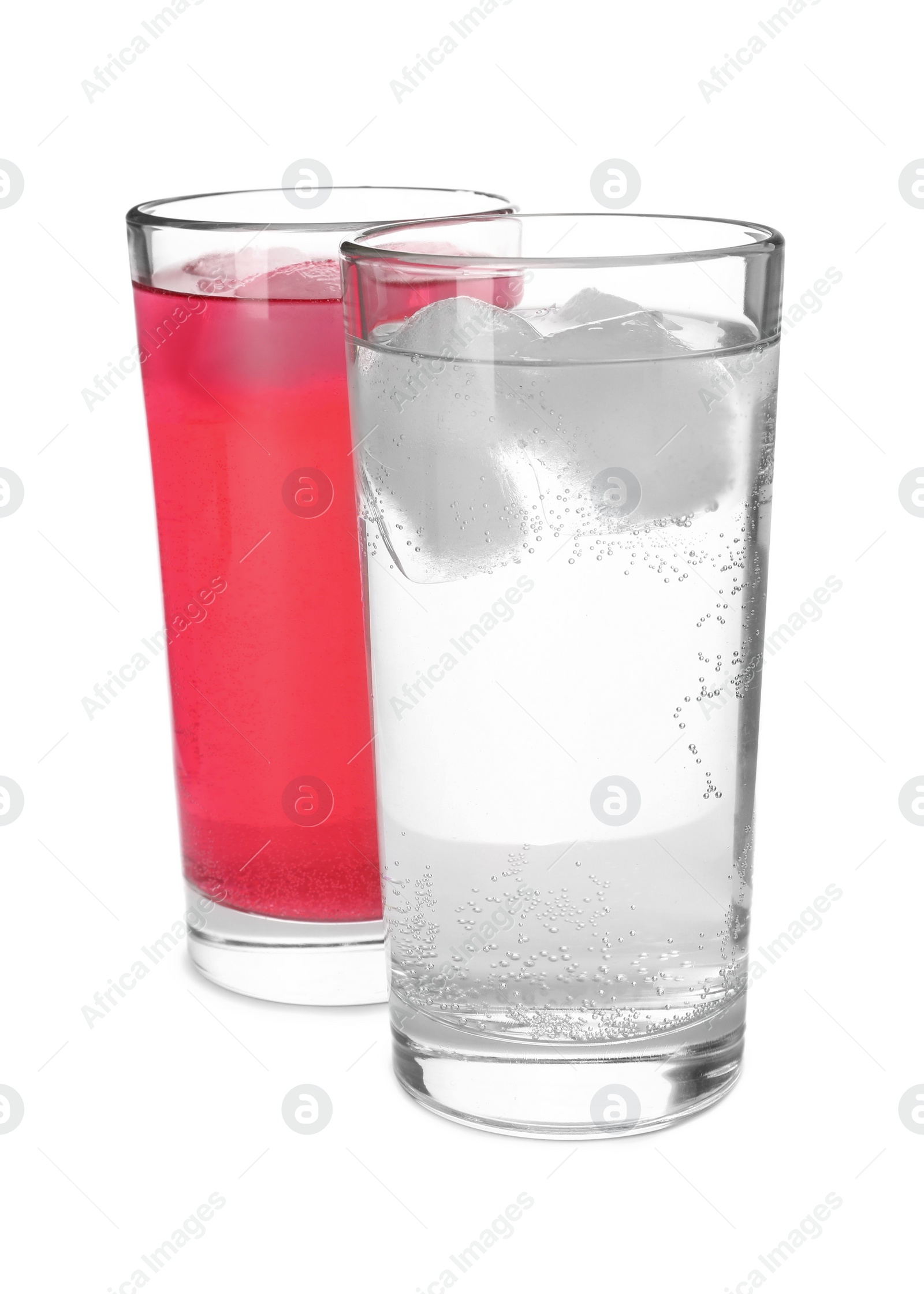 Photo of Glasses of different refreshing soda water with ice cubes on white background