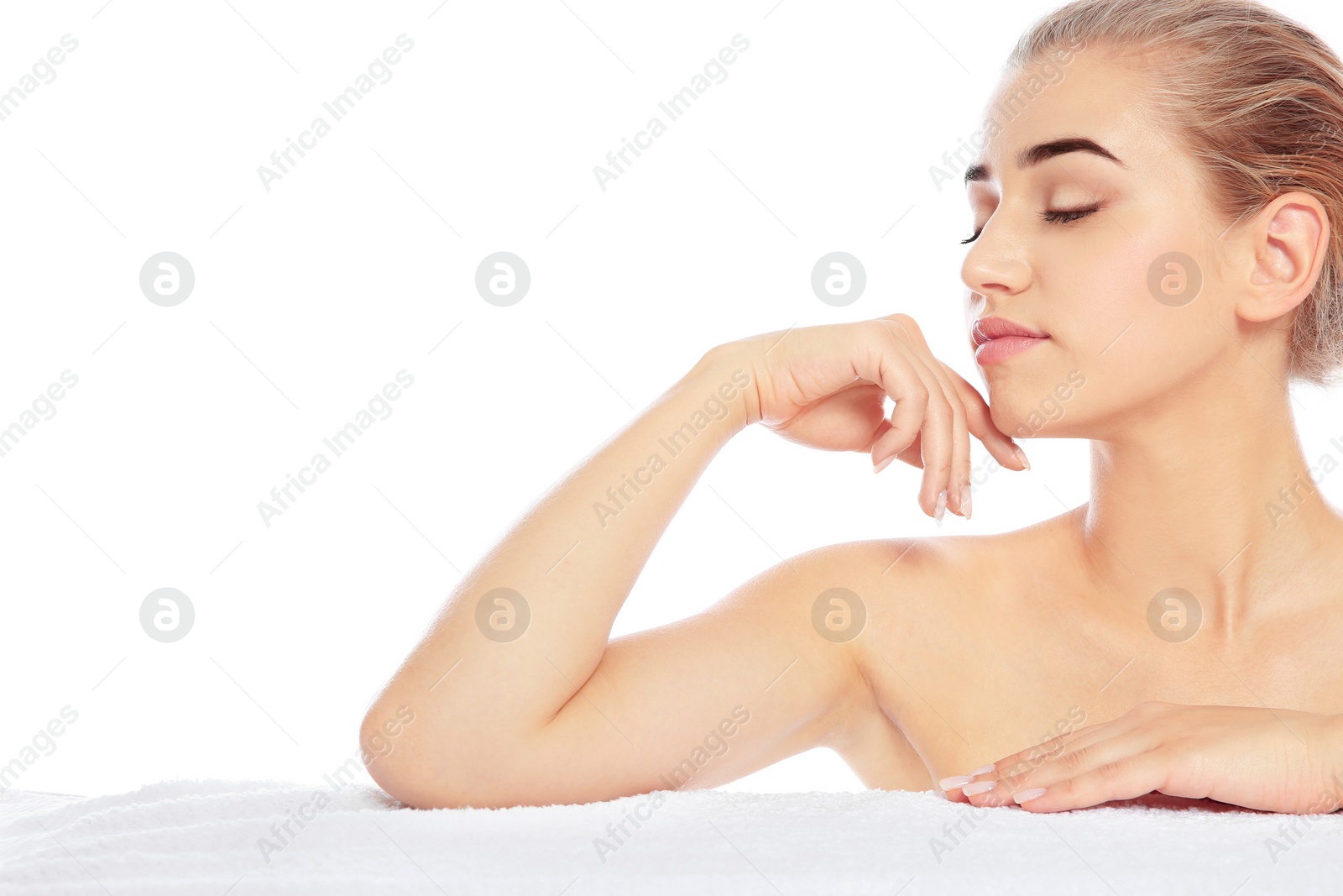 Photo of Portrait of young pretty woman with towel on white background