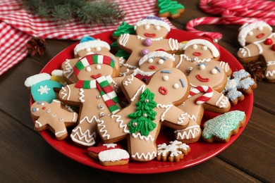 Photo of Delicious Christmas cookies on wooden table, closeup