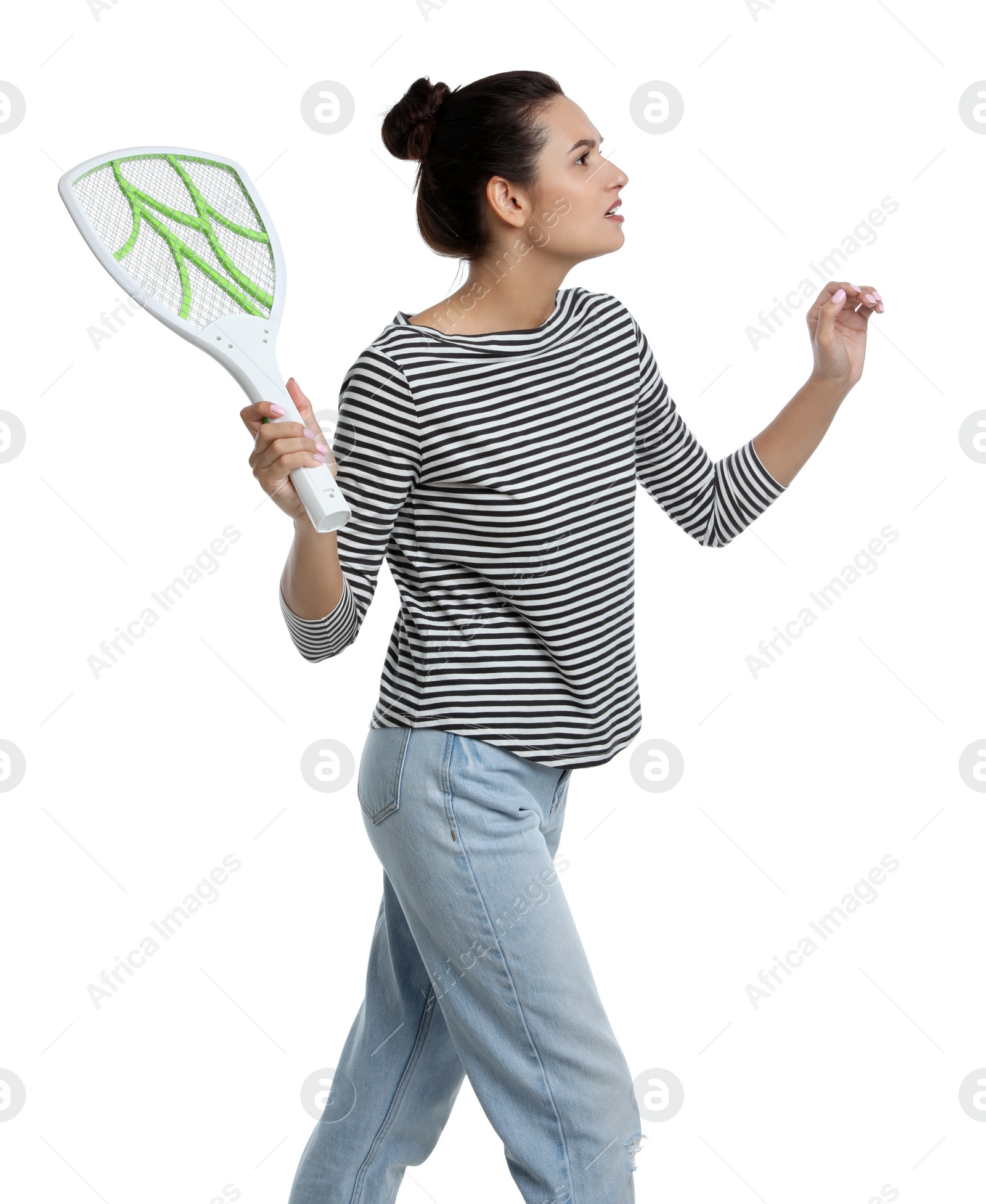 Photo of Young woman with electric fly swatter on white background. Insect killer