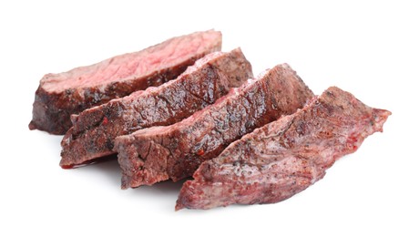 Photo of Slices of tasty grilled beef meat isolated on white