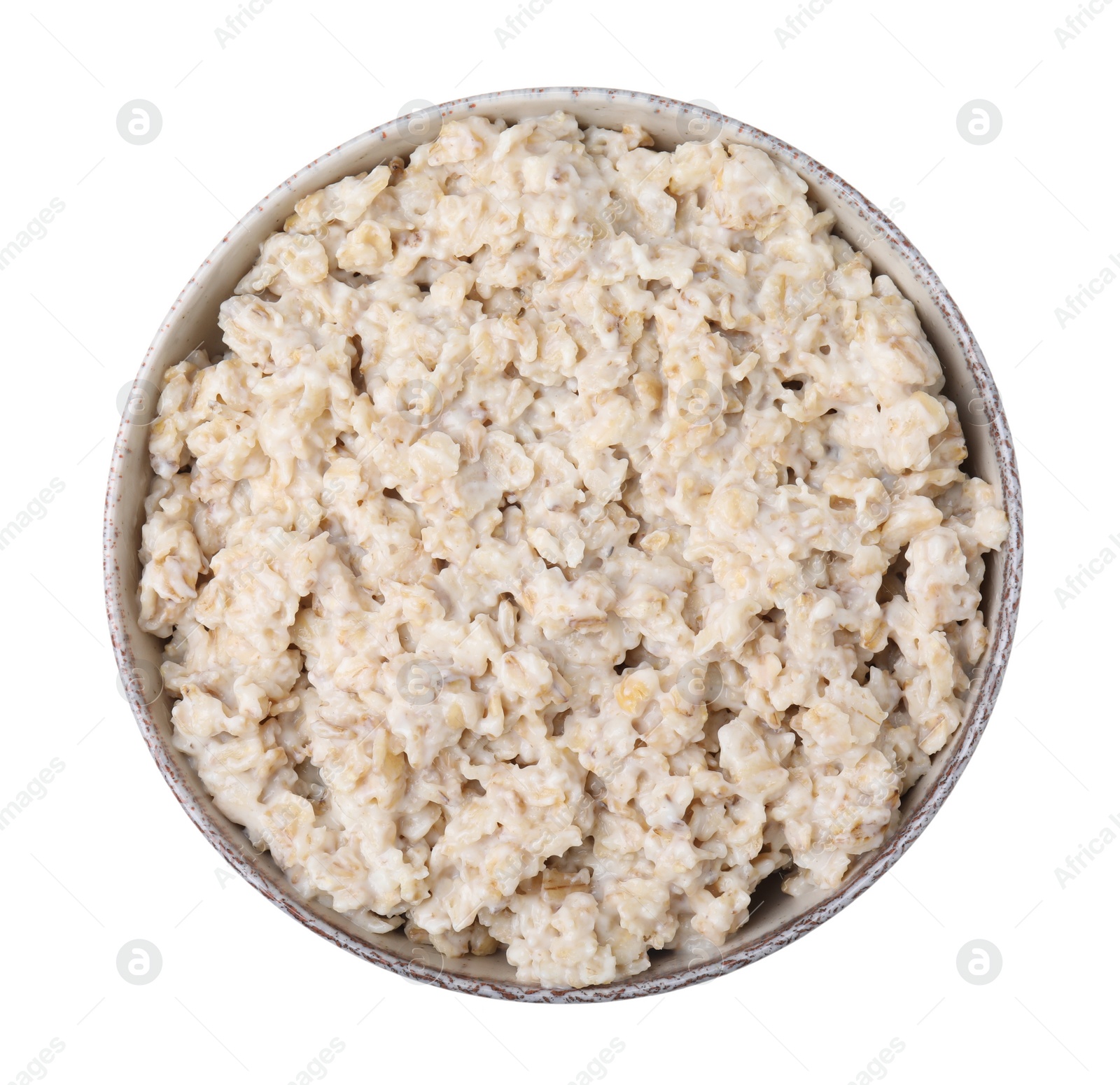 Photo of Ceramic bowl with oatmeal isolated on white, top view