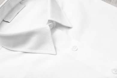 Photo of White shirt, closeup view. School uniform