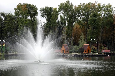 Photo of Beautiful view of fountain in park on autumn day