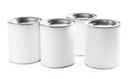 Photo of Closed blank cans of paint isolated on white