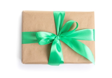 Photo of Beautifully wrapped gift box on white background, top view