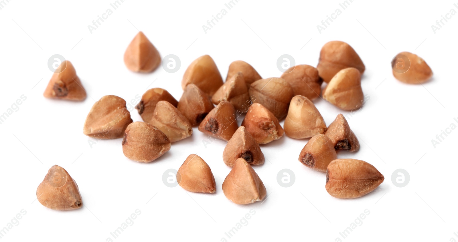 Photo of Buckwheat grains isolated on white. Organic cereal