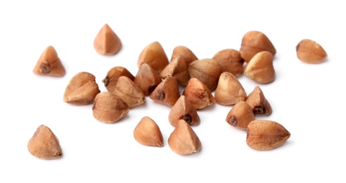 Buckwheat grains isolated on white. Organic cereal