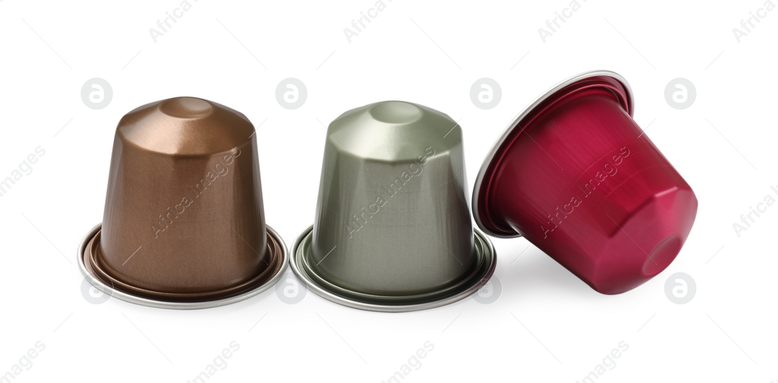 Photo of Three plastic coffee capsules isolated on white