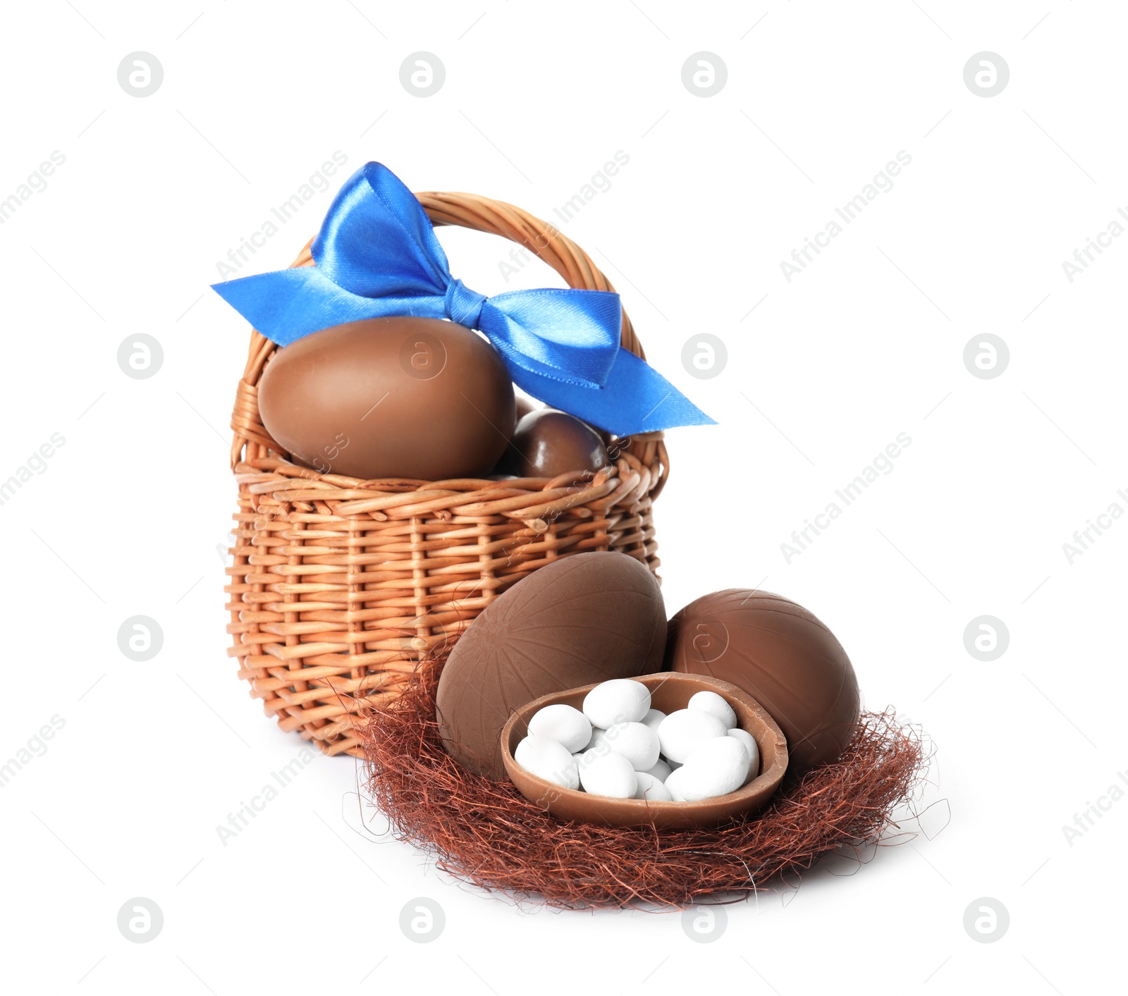 Photo of Composition with delicious chocolate Easter eggs on white background