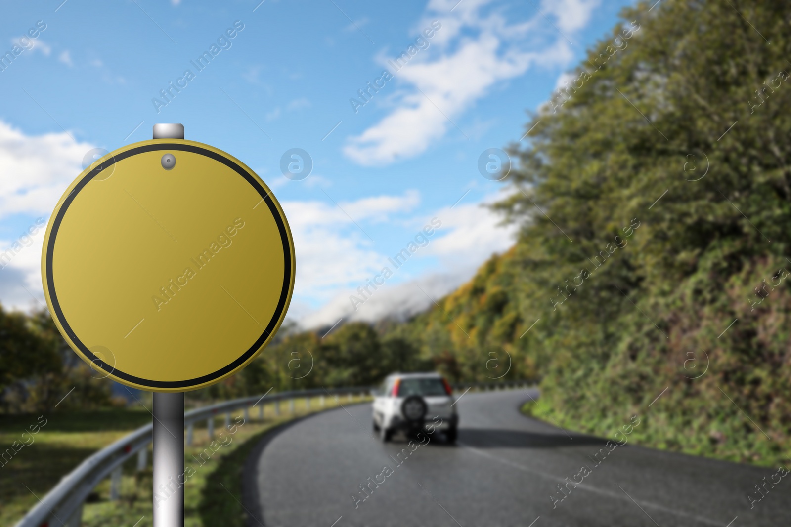 Image of Blank yellow road sign on asphalt highway, space for text